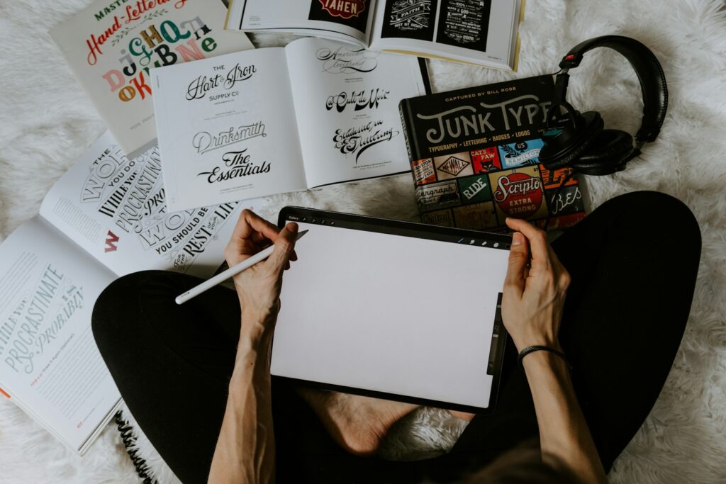 Optimize brand kits in Canva for low energy visuals 2026:person holding white printer paper